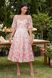 Robe midi fleurie rose brodée à col rond avec demi-manches