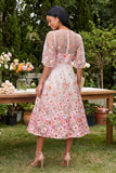 Robe midi fleurie rose brodée à col rond avec demi-manches