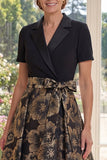 Une robe longue Jacquard longue à col en V noir avec nœud de la mariée