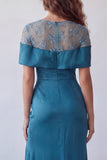 Robe formelle de sirène en satin transparent bleu paon dénudée