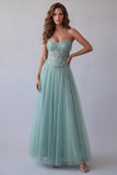 Corset vert bustier Une robe formelle appliquée en tulle à la ligne