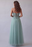 Corset vert bustier Une robe formelle appliquée en tulle à la ligne