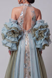 Robe longue de concours longue à fleurs perlées et scintillante au champagne avec une cape