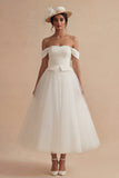 Robe de mariée bohème longue à large épaule blanche décollée A