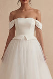 Robe de mariée bohème longue à large épaule blanche décollée A
