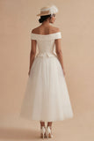 Robe de mariée bohème blanche longue à épaules décalées