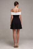 Robe cocktail en ligne A à épaules froides noire et blanche avec nœud