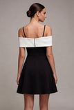 Robe cocktail en ligne A à épaules froides noire et blanche avec nœud