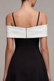 Robe cocktail en ligne A à épaules froides noire et blanche avec nœud