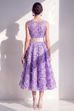 Robe midi fleurie bleue à col rond appliquée avec nœud