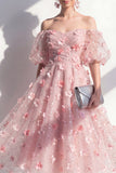 Robe midi fleurie à paillettes à la ligne A décollée des épaules