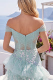 Robe de balles à la fine avec corset menthe et paillettes à l’épaule dénudée