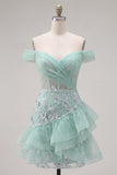 Robe de balles à la fine avec corset menthe et paillettes à l’épaule dénudée