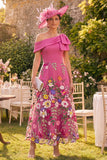 Robe fleurie longue fleur fûte en fuchsia avec un nœud et nœud