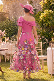 Robe fleurie longue fleur fûte en fuchsia avec un nœud et nœud
