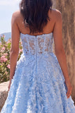 Robe midi fleurie bleue sans bretelles transparente corset transparent