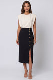 Robe de travail midi à col rond en ivoire et noire avec fente