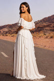 Robe de mariée bohème à volants en ivoire décalée