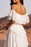 Robe de mariée bohème à volants en ivoire décalée