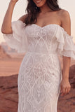 Robe de mariée sirène bohème en dentelle ivoire dénudée