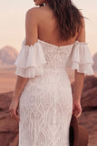 Robe de mariée sirène bohème en dentelle ivoire dénudée