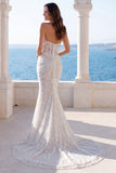 Robe de mariée sirène en ivori de dos nus et paillettes froncées
