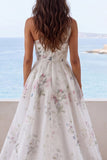 Robe de mariée à volants en ivoire à épaules décalées