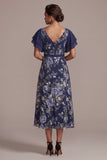 Robe midi midi marin marine à décolleté en V fleurie avec fente