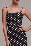 Robe à pois midi à bretelles en sirène noir et blanc