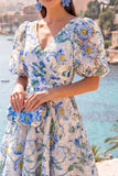 Robe midi fleurie bleue en V à col en A avec manches bouffantes