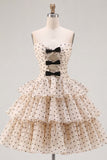 Robe de balaise à étages en chiffon à pois noirs abricot avec nœud