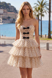 Robe de balaise à étages en chiffon à pois noirs abricot avec nœud