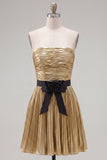 Robe dorée de la rentrée, plissée, plissée, brotellée et nœud de fin d’année