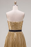 Robe dorée de la rentrée, plissée, plissée, brotellée et nœud de fin d’année