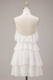 Petite robe blanche en chiffon fleuri à col nu et volants