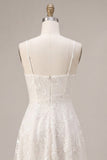 Mini-robe fleurie à bretelles fines ivoire A-Line