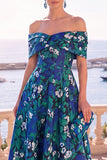 Robe midi en ligne A à fleur vert marine décollée sur l’épaule avec lacet dans le dos