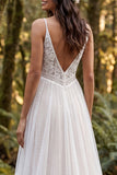 Robe longue de mariée ivoire à bretelles fines à volants