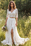 Robe de mariée longue en dentelle ivoire à manches demi-manches en V à longueur avec fente