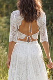 Robe de mariée longue en dentelle ivoire à manches demi-manches en V à longueur avec fente