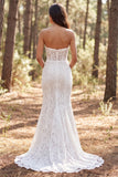Robe de mariée longue en dentelle ivoire en dentelle sirène à volants sans bustier avec fente