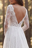 Robe de mariée en dentelle à manches longues en ivoire avec fente