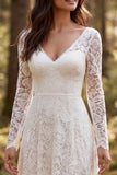 Robe de mariée en dentelle ivoire à manches longues en A avec fente