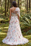 Robe de mariée longue en ivoire fleurie en A avec une épaule et fente