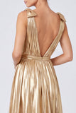 Robe formelle longue en or métallique à col en V en ligne A avec fente