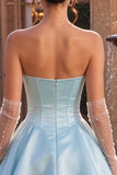 Robe de fin d’année en satin à volants en satin à la taille basque sans bretelles à la taille basque