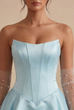 Robe de fin d’année en satin à volants en satin à la taille basque sans bretelles à la taille basque