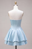 Robe de fin d’année en satin à volants en satin à la taille basque sans bretelles à la taille basque