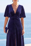 Robe midi à pois bleu marine à haut et bas ourlet en V avec manches courtes flottantes