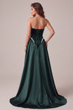 Robe de soirée longue en velous vert foncé perlée à bec perlée en velous de cheval